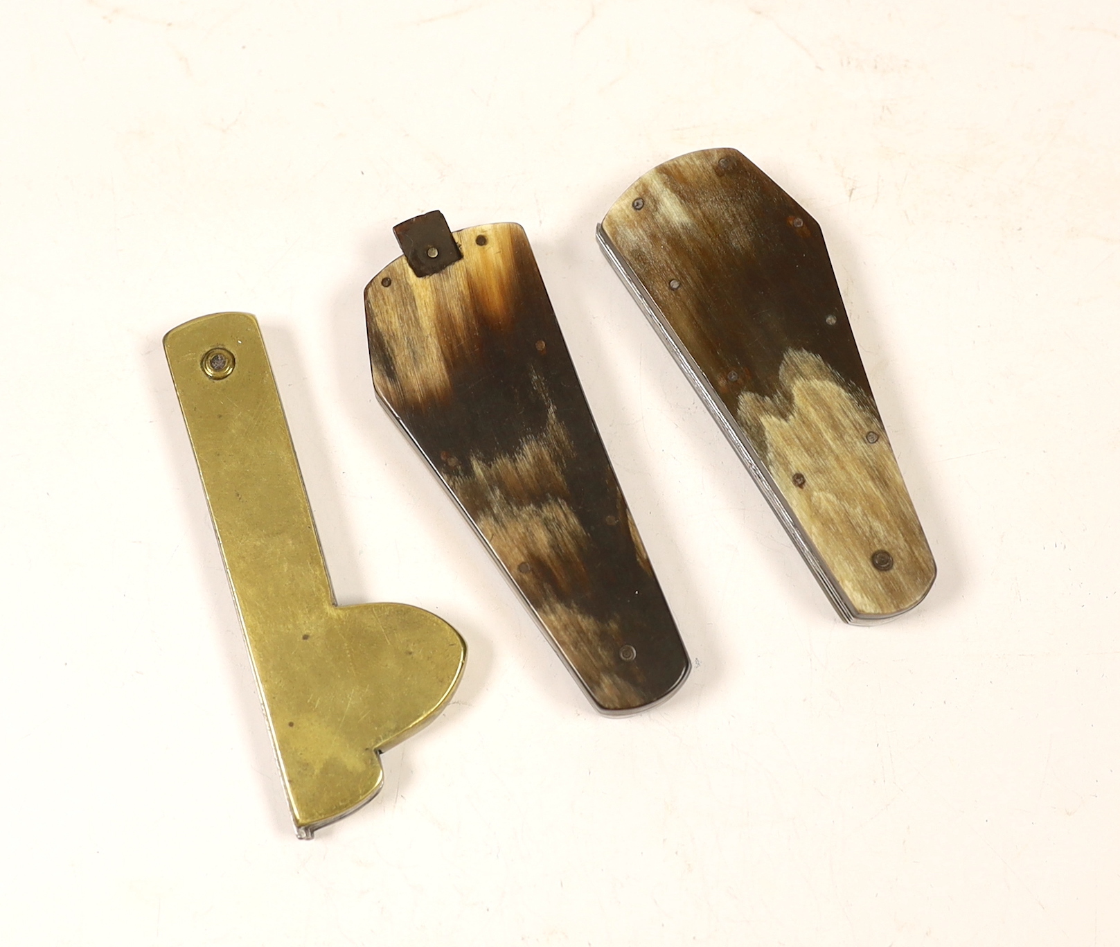 Three early 19th century Fleams; one with brass handle and two with horn handles by Lockwood Brothers, Sheffield and W. Broadhurst